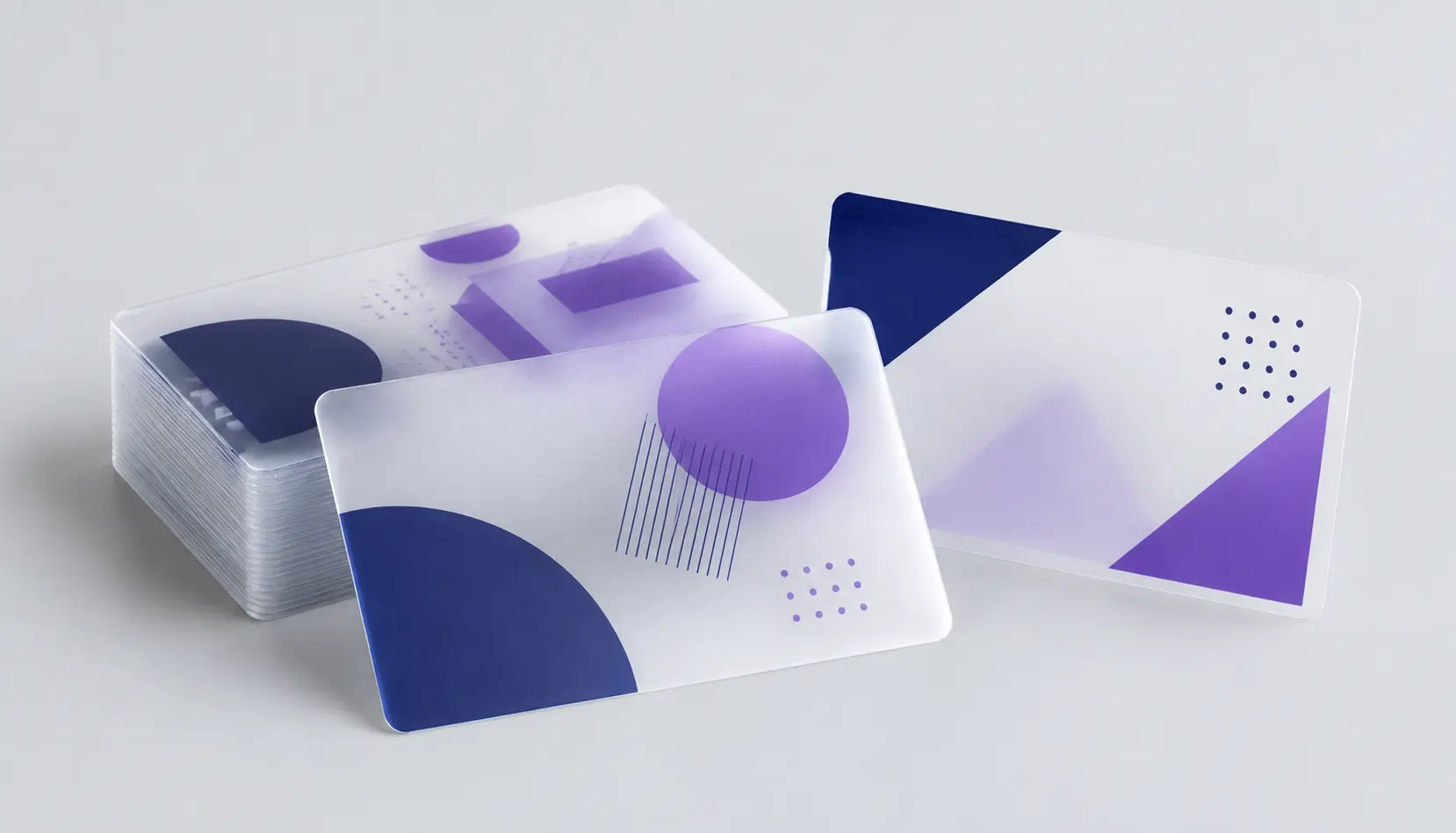 Translucent plastic business cards shown in a studio product arrangement